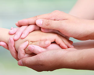 Close up of people holding hands. Link to Gifts of Life Insurance. Close up of people holding hands. Link to Gifts of Life Insurance.