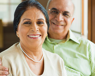 A couple smiling. Link to Tangible Personal Property. A couple smiling. Link to Tangible Personal Property.